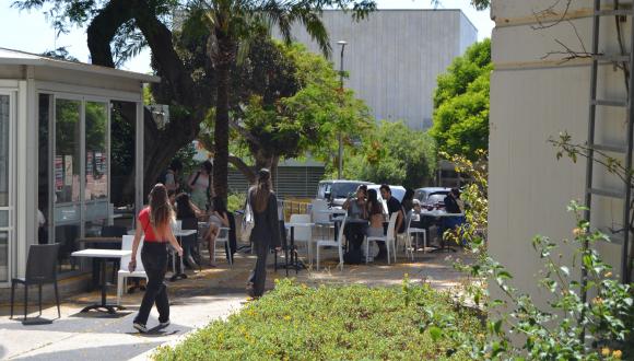Students outside by food court in summer